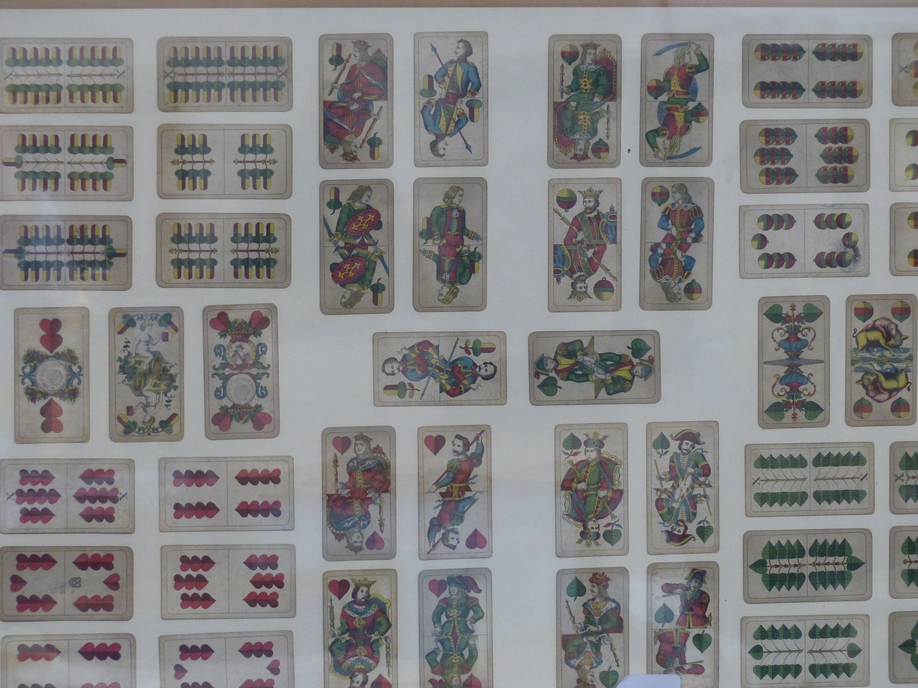 Framed 19th century playing cards